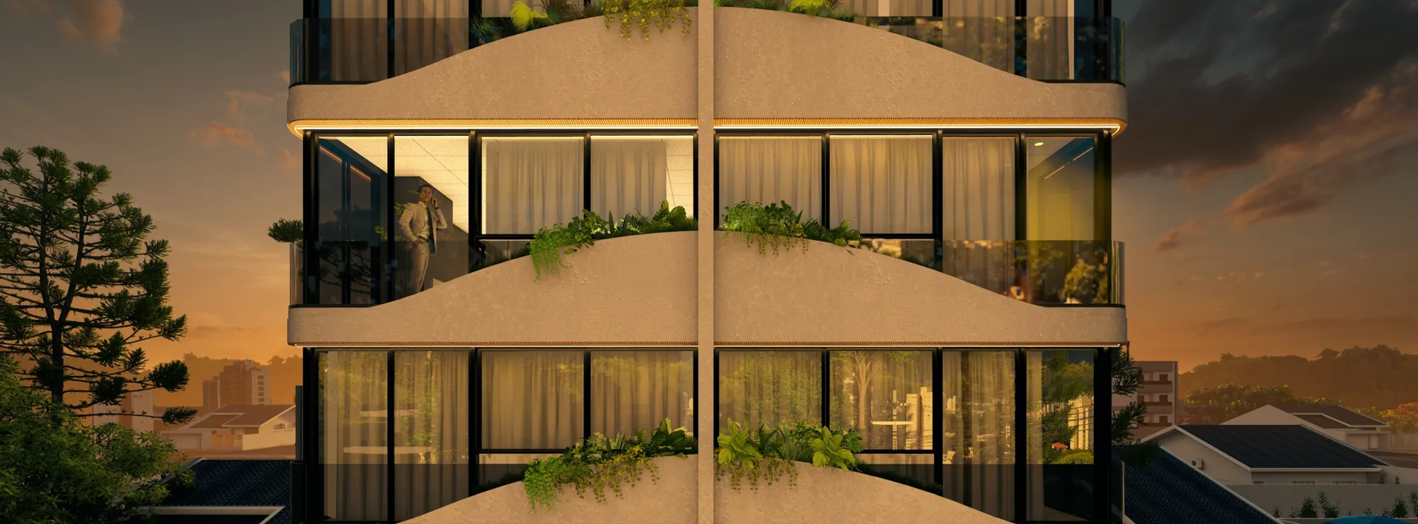 Detalhe das varandas em curva com jardineiras ao entardecer